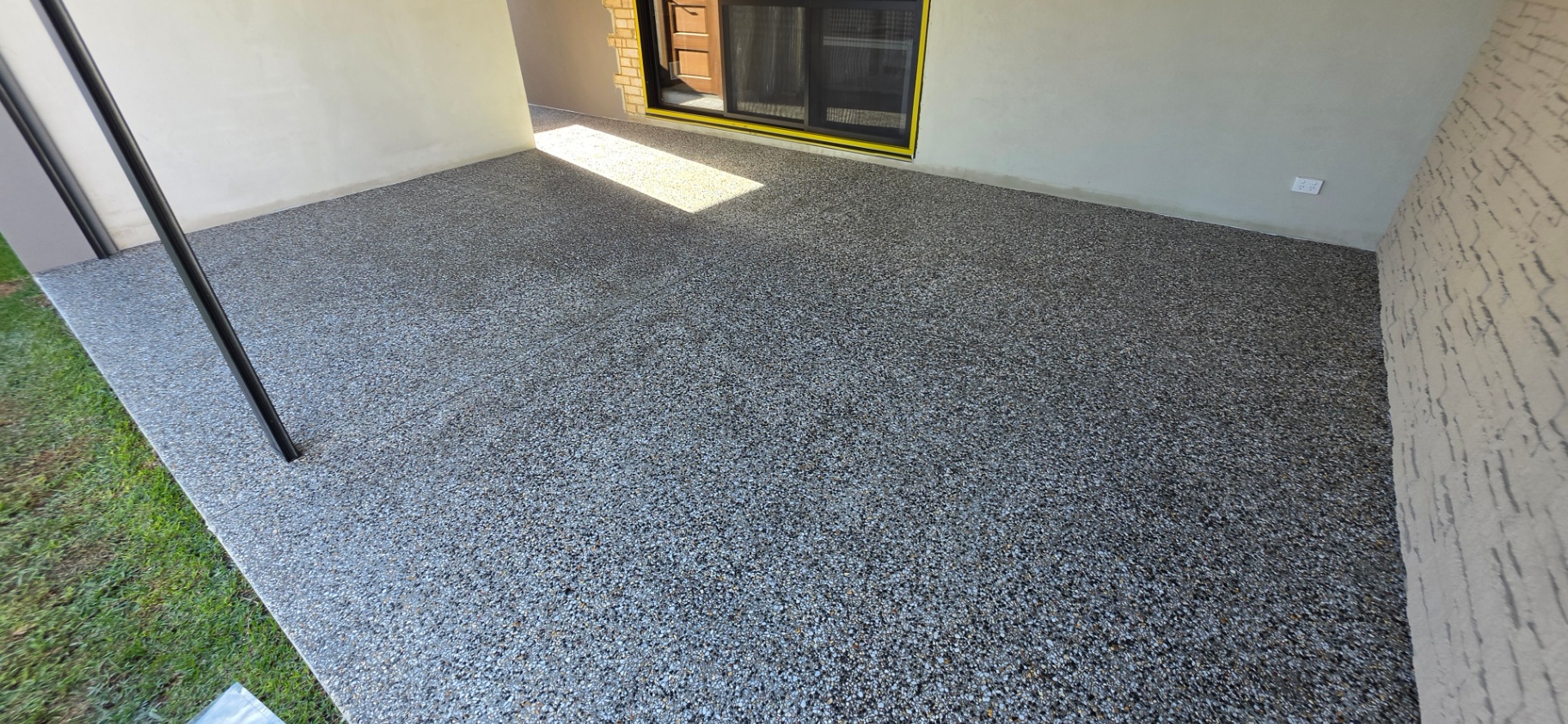 Honed washed aggregate finish