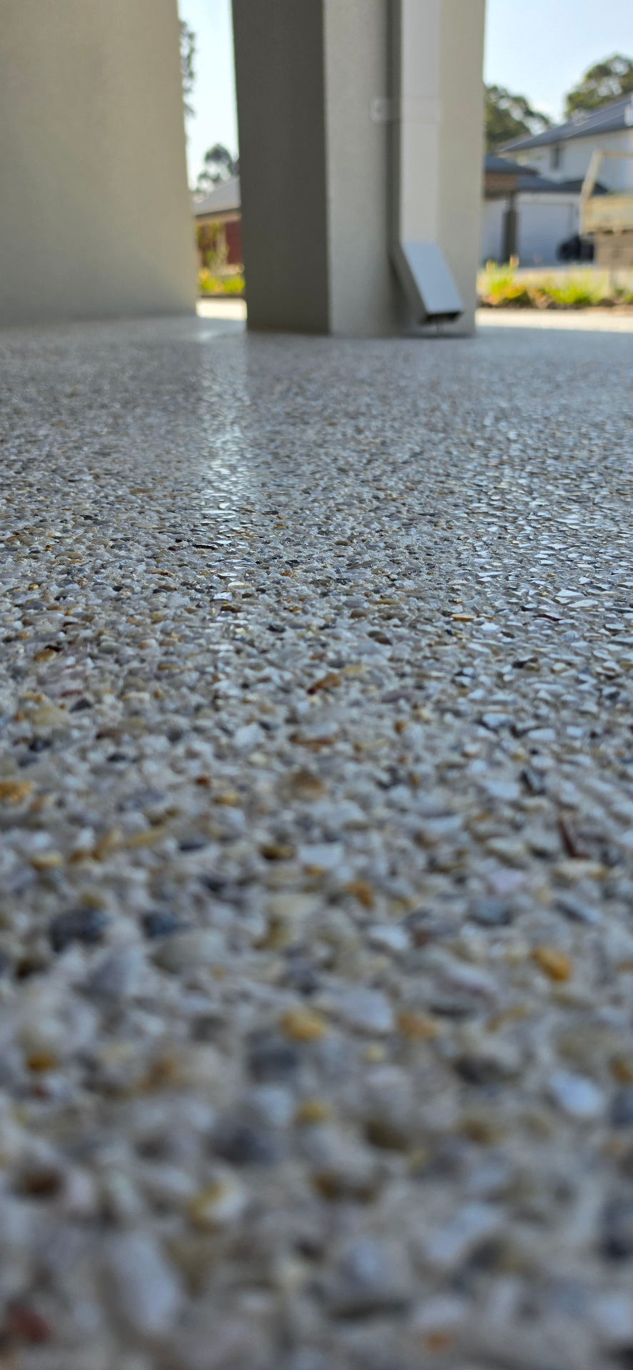 Honed washed aggregate finish