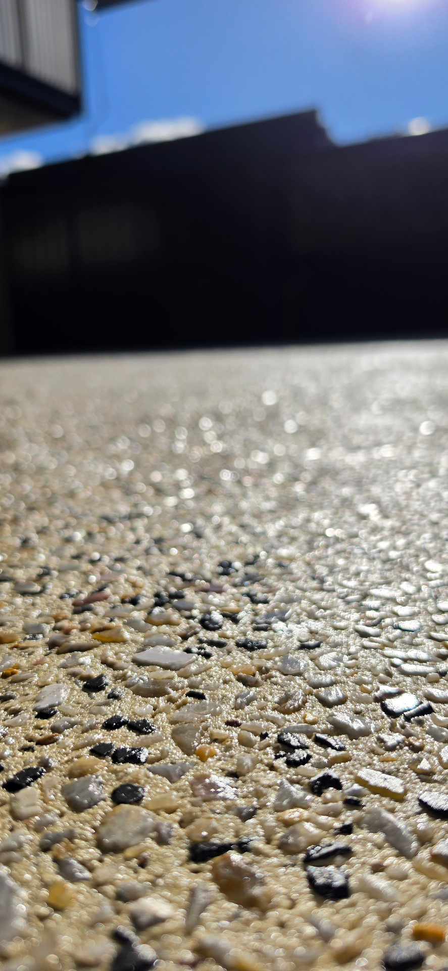 Honed washed aggregate finish