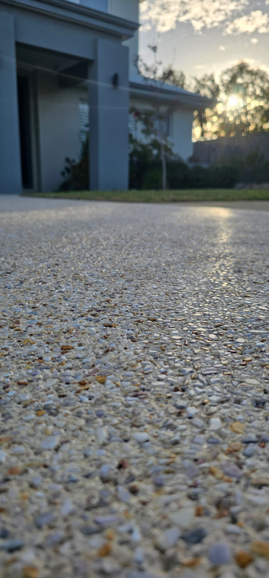 Honed washed aggregate finish