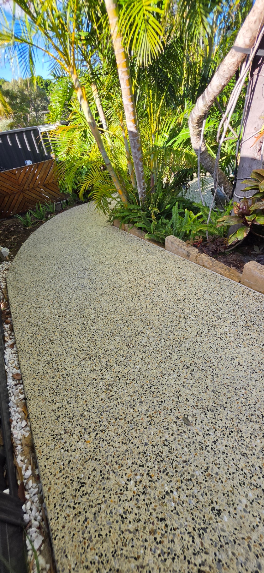 Honed washed aggregate finish