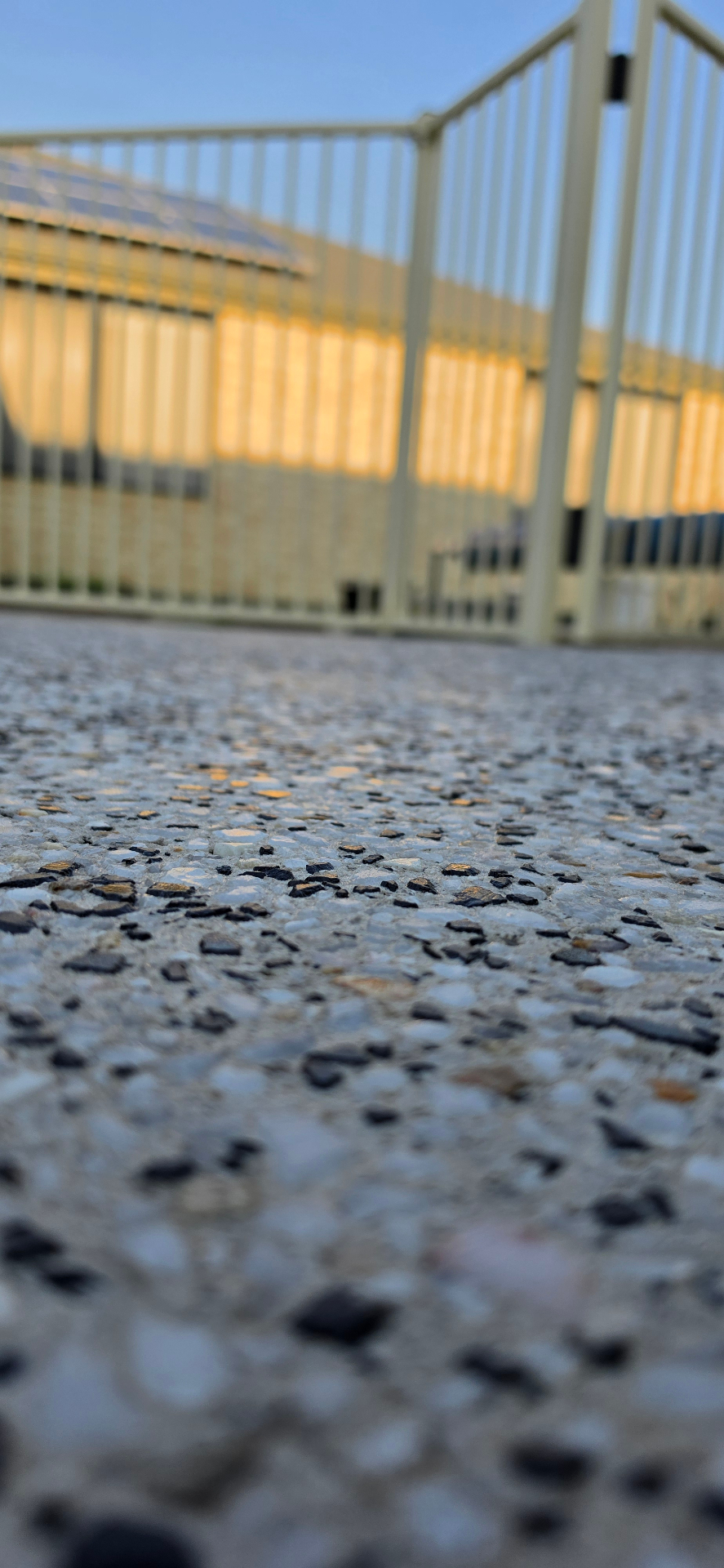 Honed washed aggregate finish