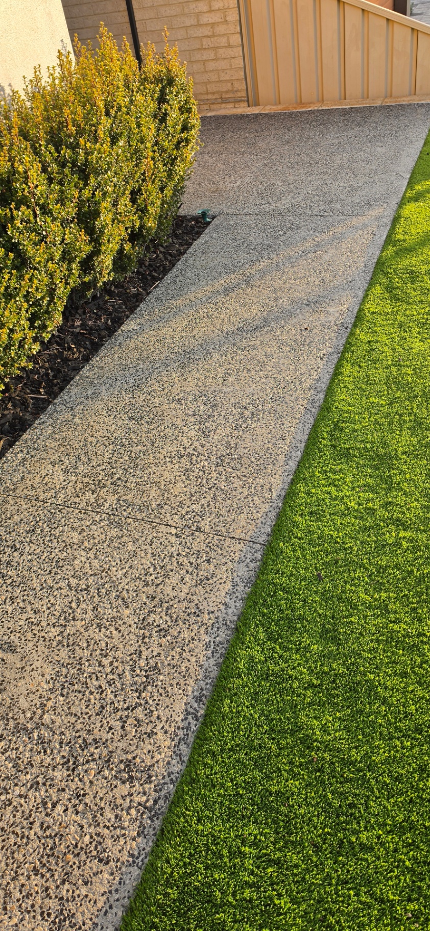 Honed washed aggregate finish