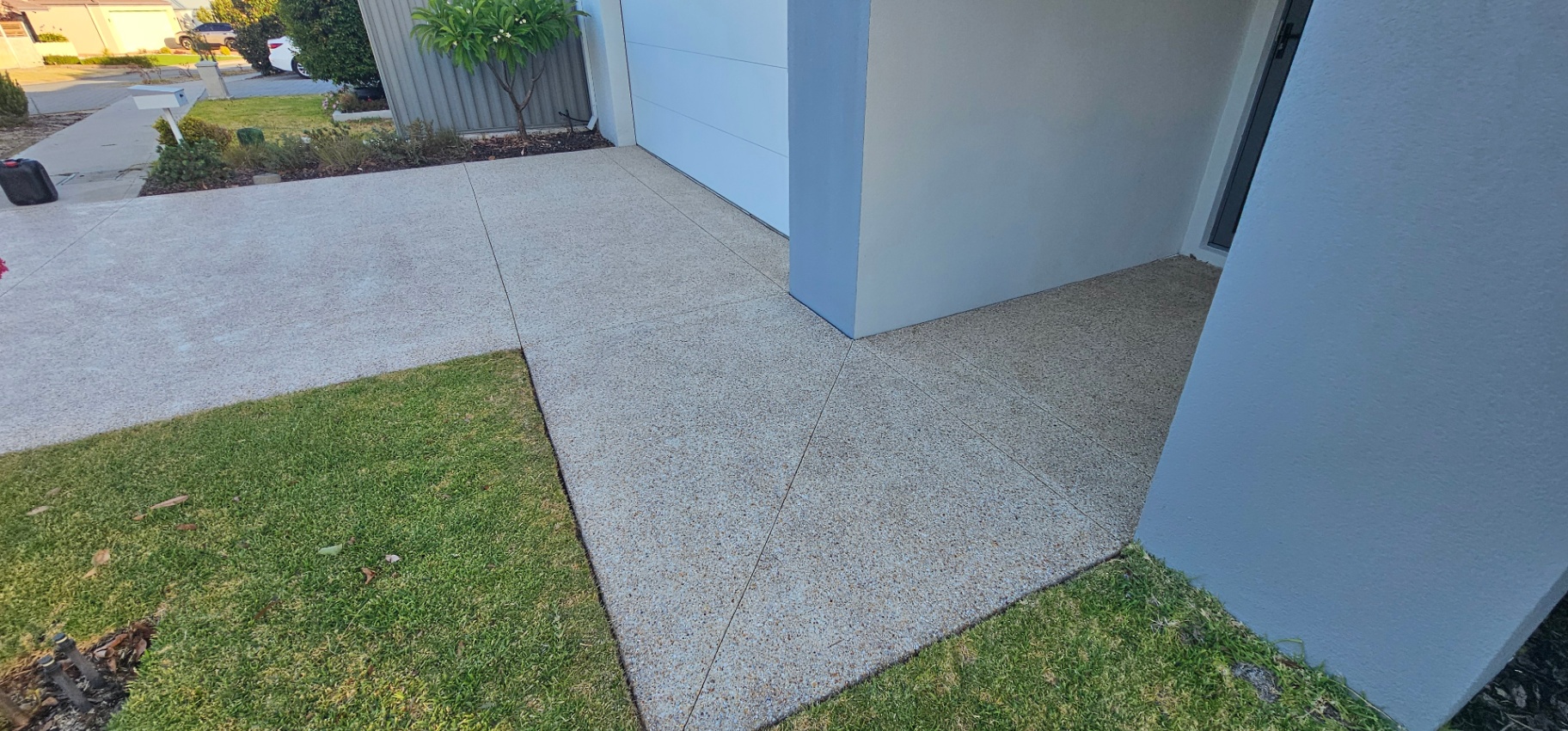 Honed washed aggregate finish