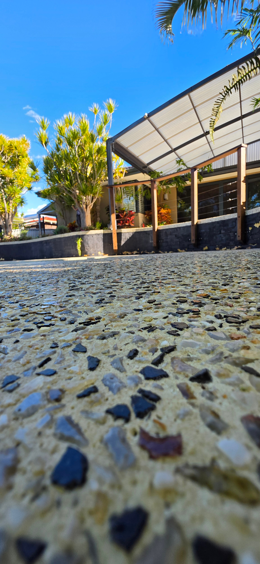 Honed washed aggregate finish