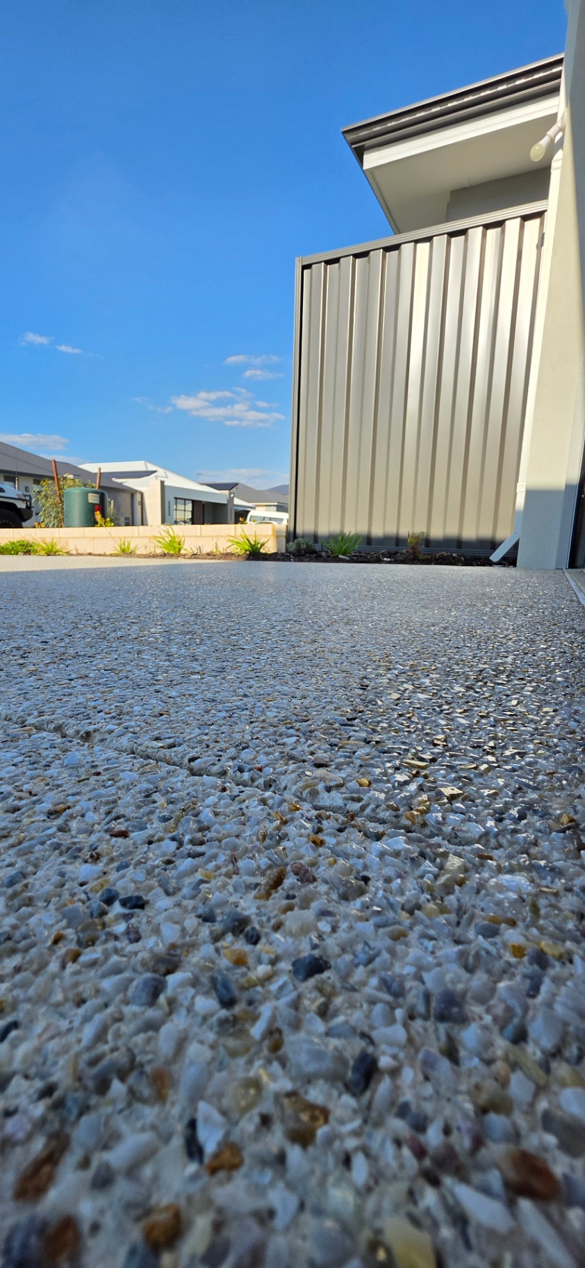 Honed washed aggregate finish