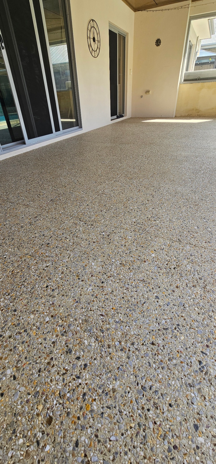 Honed washed aggregate finish