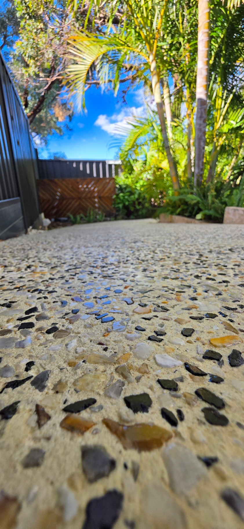 Honed washed aggregate finish