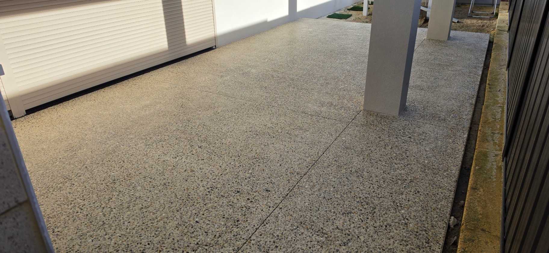Honed washed aggregate finish